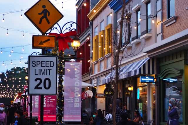 Area Broadway Alley at The Flavor Bliss, featuring string lights for festive outdoor events.