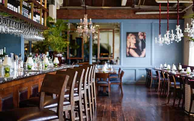 Sophisticated restaurant in Le Quartier, with elegant decor for events and celebrations.