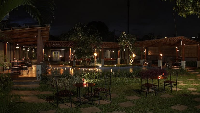 Enchanting outdoor dining hall at Omah Sendok with warm lighting for evening events.