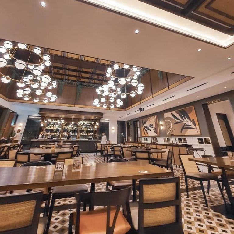 Modern event space in Penang Bistro with elegant ambiance, ideal for networking and dining.