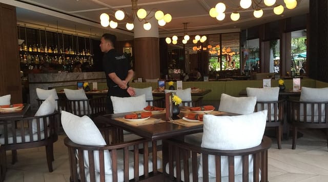 Stylish dining area at Seribu Rasa for casual meetings and celebrations.