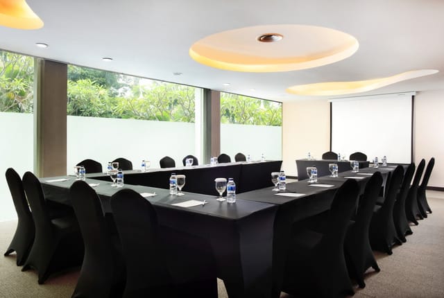 Modern conference room in Grandkemang Hotel Jakarta, ideal for meetings and events.