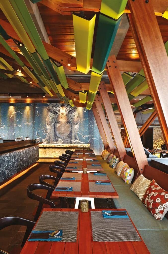 Vibrant SKYE restaurant with striking mural, perfect for events and dining experiences.