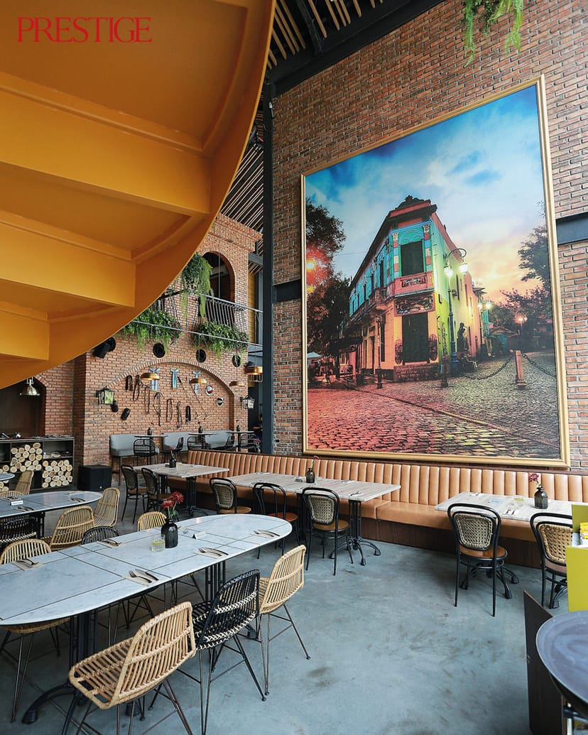 Vibrant indoor event space with mural, ideal for gatherings and workshops.