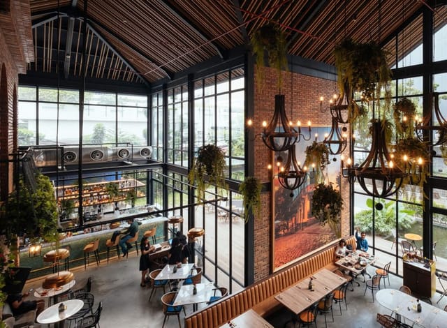Modern Sudestada restaurant venue with large windows for meetings and events.