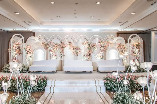 Elegant floral stage in Indonesia Room, Shangri-La Jakarta for weddings and upscale events.