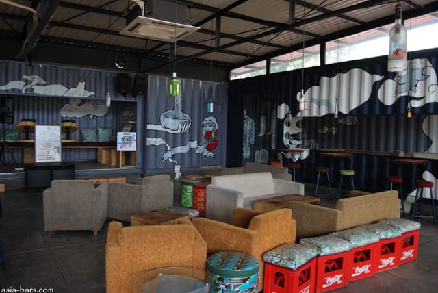Main Bar Area in 365 Eco Bar, featuring industrial seating for creative events and workshops.