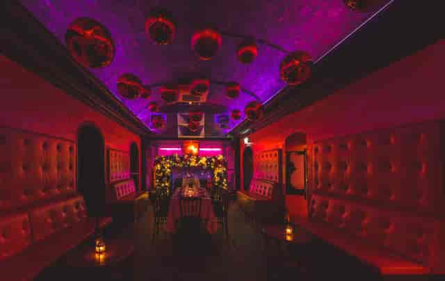 Vibrant TOY ROOM venue with plush seating for cocktail receptions and themed events.