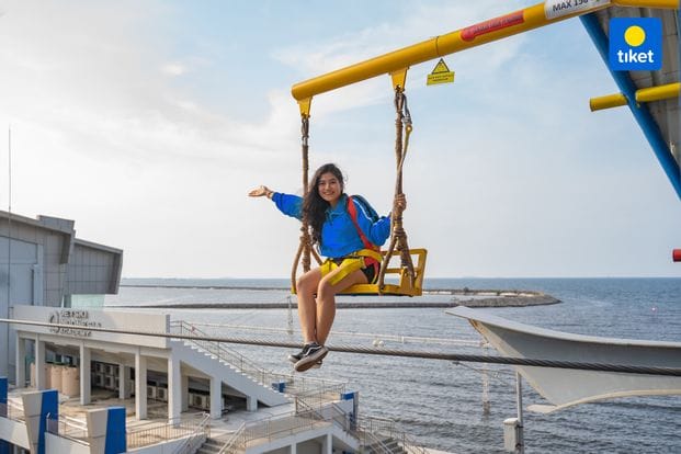 Amusement park zip line ride at Gondola Ancol, perfect for team-building events.