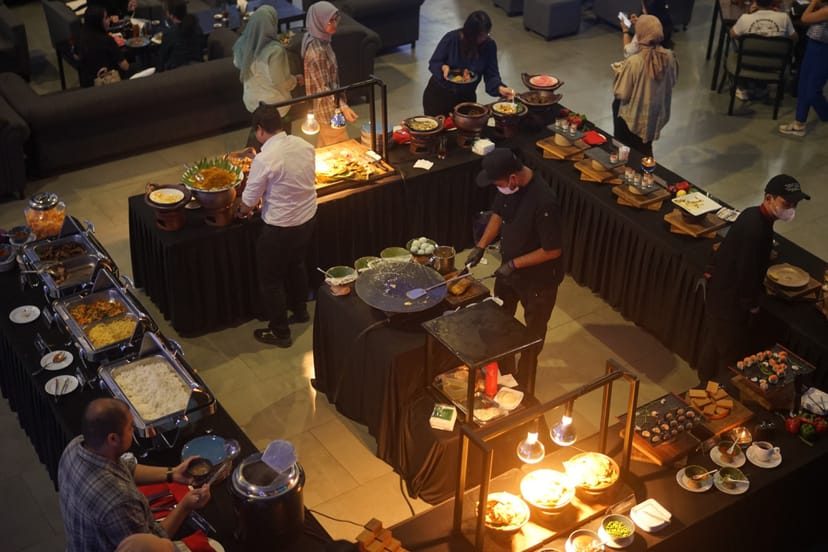 Buffet setup at Steak Hall, Bengkel Space for networking event and catering.