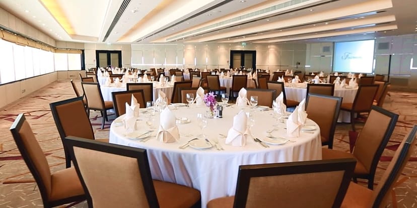 Gulf Auditorium banquet setup with elegant tables for corporate events in Dubai Opera.