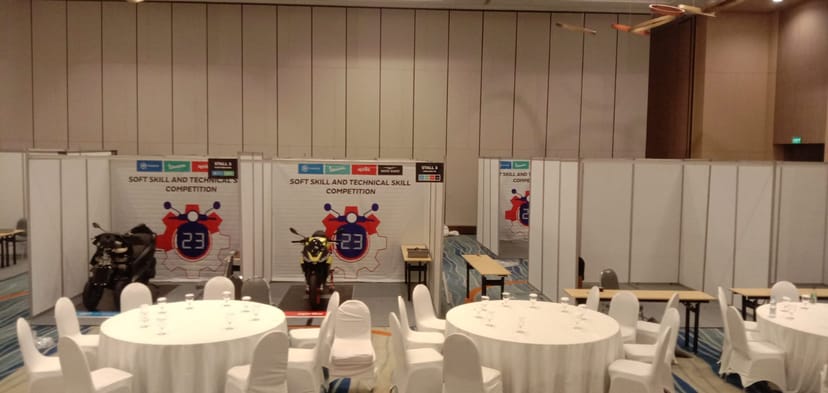 Party equipment rental setup for skills competition with networking tables and branding.