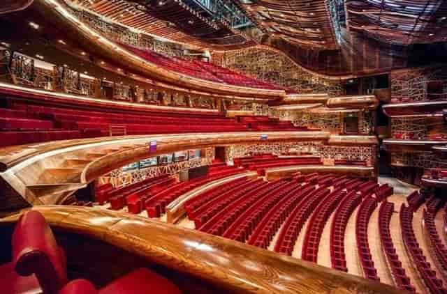 Grand Circle Foyer in Dubai Opera, tiered seating, elegant venue for performances and presentations.