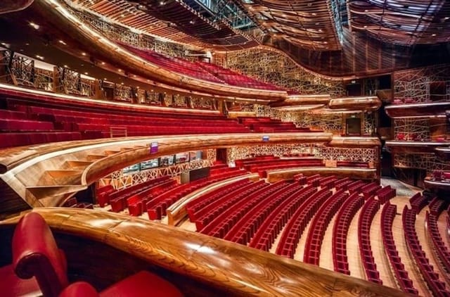 Grand Circle Foyer in Dubai Opera, tiered seating, elegant venue for performances and presentations.