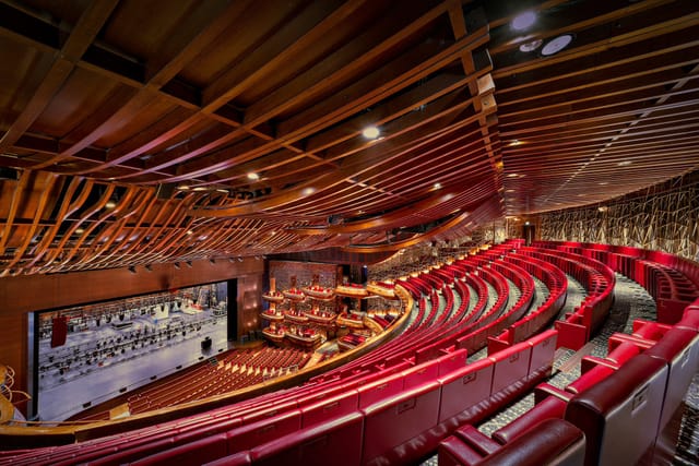 Modern Dubai Opera auditorium with tiered seating, ideal for concerts and conferences.