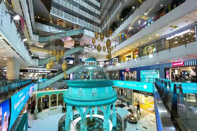 "Grand Indonesia West Mall: vibrant multi-level shopping hub with striking architecture for events."