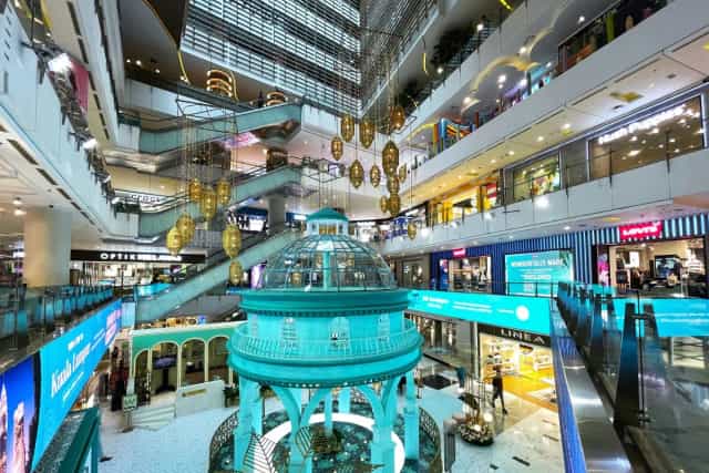 "Grand Indonesia West Mall: vibrant multi-level shopping hub with striking architecture for events."