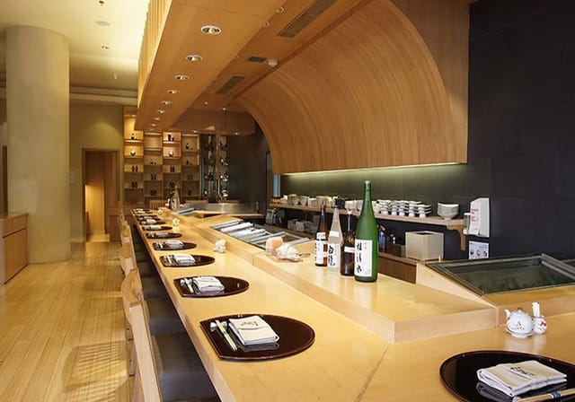 Modern sushi bar in Asuka Japanese Dining, ideal for intimate culinary events and tastings.