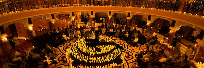 Elegant Al Falak Ballroom with circular seating for intimate music events at Burj Al Arab.