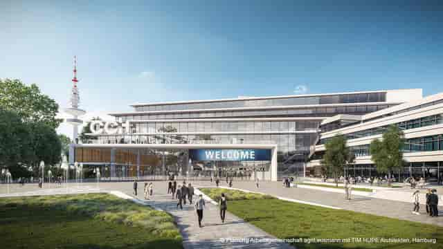 Modern Congress Center Hamburg for conventions, featuring a "WELCOME" sign and lush landscaping.