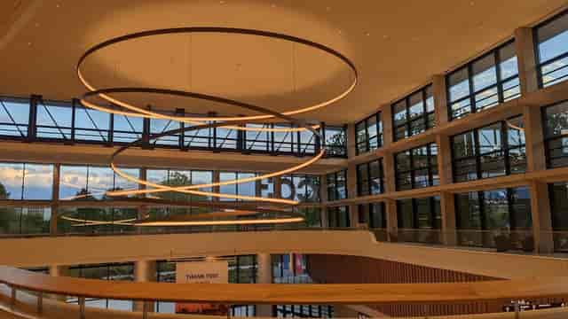Modern event space in CCH Hamburg with circular light fixtures for conferences and meetings.
