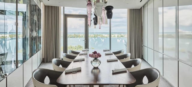 Modern boardroom with panoramic waterfront views for meetings and events in Hamburg.