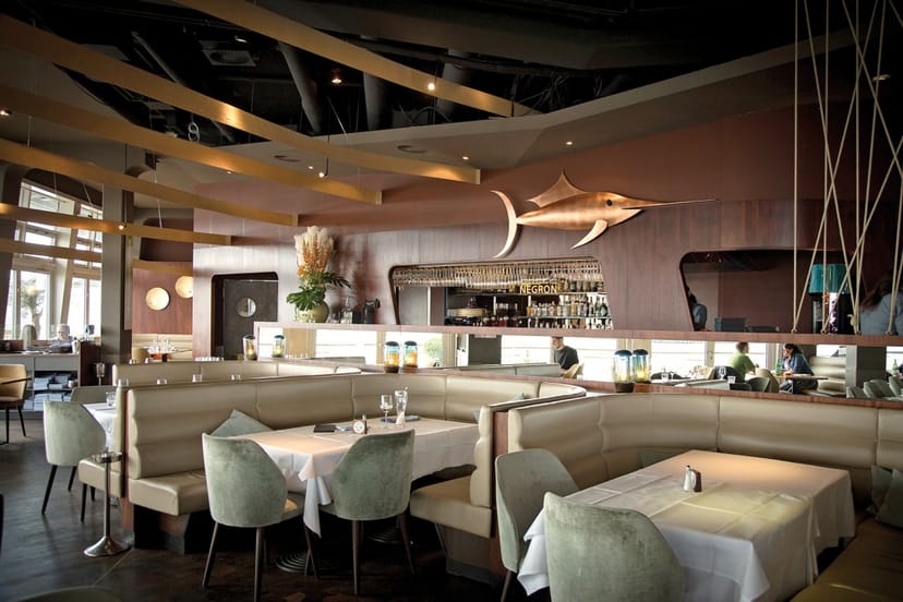 Stylish restaurant with nautical decor, ideal for intimate dining and events.