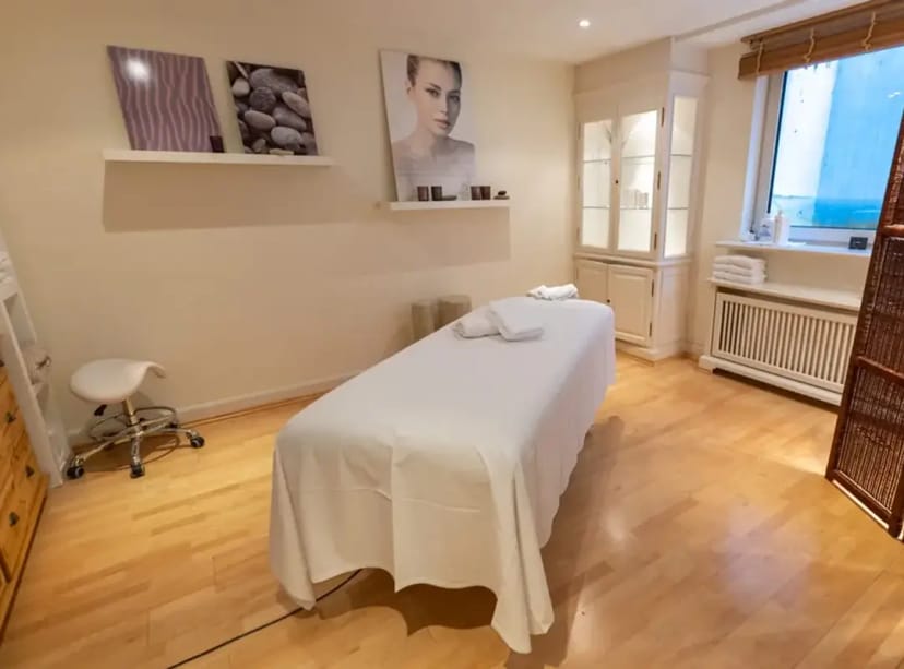 Serene spa treatment room for corporate wellness retreats at Hotel Jörg Müller.