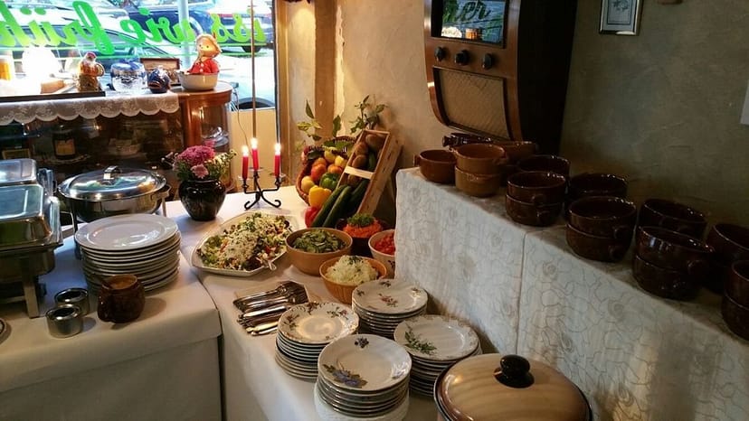 Inviting buffet setup with fresh salads at Gaststätte Kollektiv event dining.