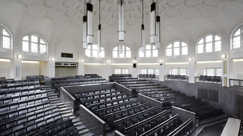 Elegant tiered auditorium in Universität Hamburg for conferences and lectures.