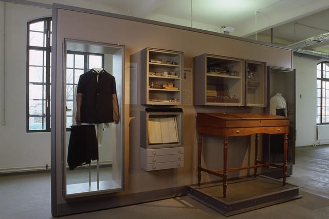 Minimalist Exhibition Hall in Museum of Work, perfect for intimate gatherings or workshops.