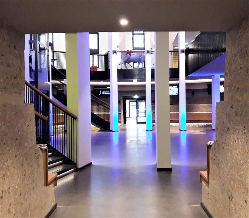 Foyer of Planetarium Hamburg, modern multi-level venue for conferences and exhibitions.