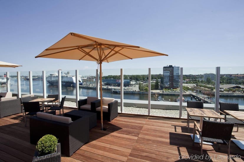 Rooftop venue at ATLANTIC Hotel Kiel with panoramic waterfront view for events.