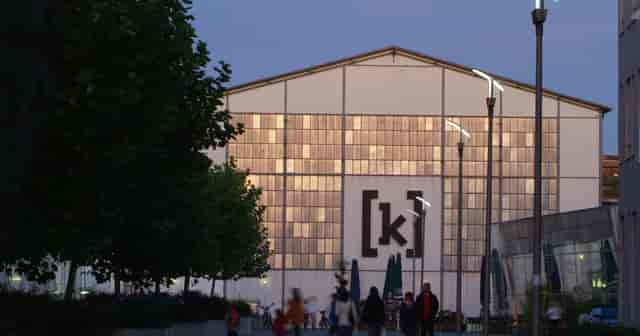 Modern event venue Halls in Kampnagel with glass panels, ideal for conferences and gatherings.