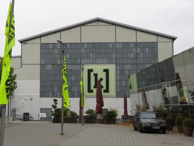 Halls at Kampnagel: modern event venue with large windows for meetings and gatherings.
