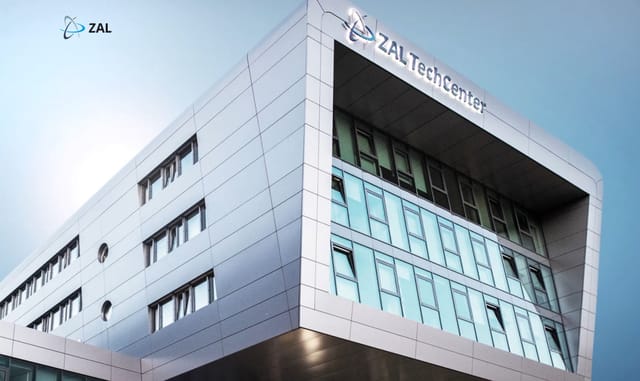 Modern corporate building with large windows for tech conferences and workshops.