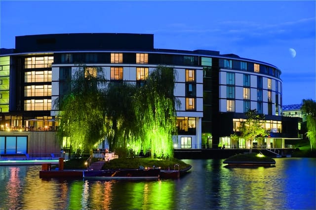 Ritz-Carlton Wolfsburg suites at twilight, perfect for elegant outdoor events.
