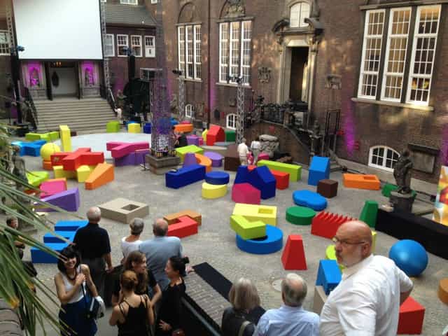 Vibrant art gallery with colorful geometric shapes, ideal for creative networking events.