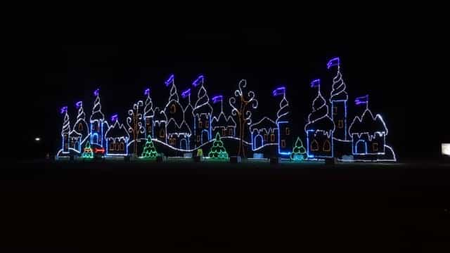 Illuminated whimsical village at The Fairgrounds for winter festivals and holiday parties.