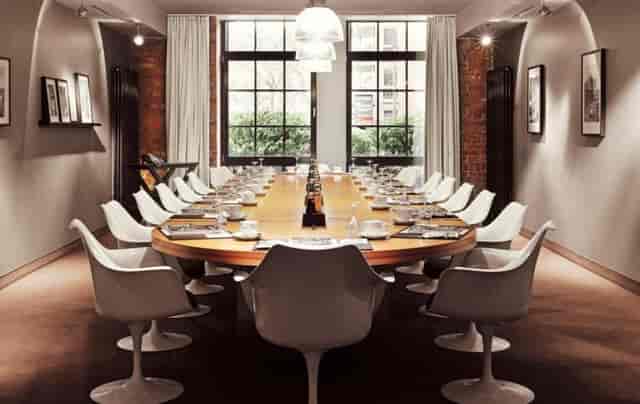 Modern Meeting Room 1 at Gastwerk Hotel Hamburg with oval table for corporate events.
