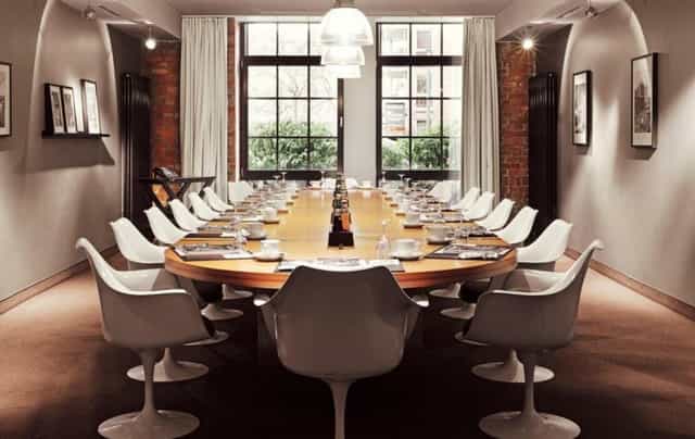 Modern Meeting Room 1 at Gastwerk Hotel Hamburg with oval table for corporate events.