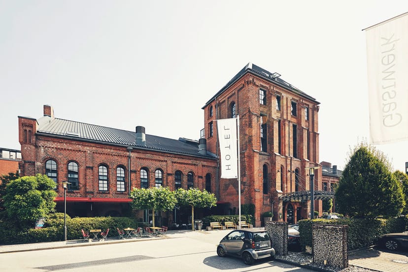 Conference room in Gastwerk Hotel Hamburg with red-brick facade for corporate events.