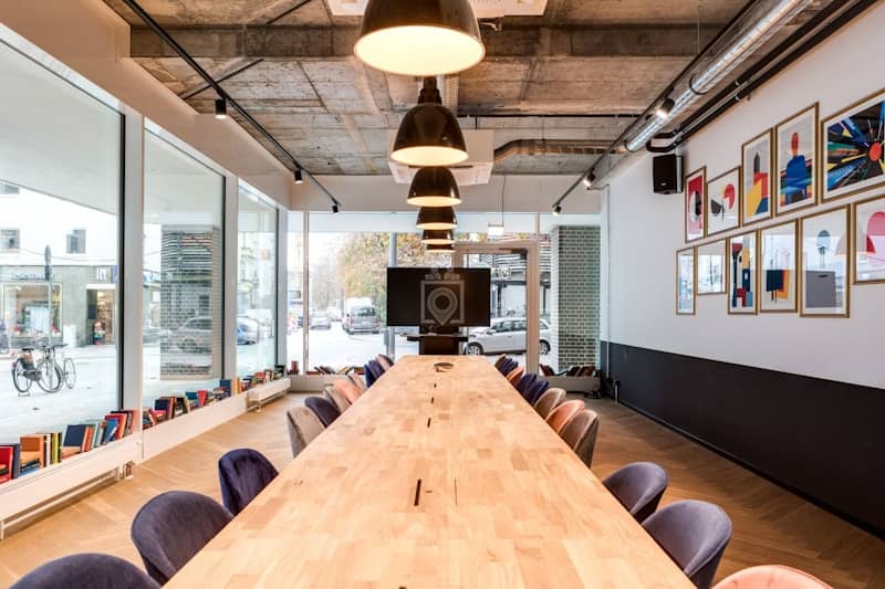 Modern meeting room, natural light, corporate event