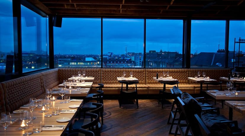 Elegant rooftop restaurant with city views, ideal for intimate events and business dinners.