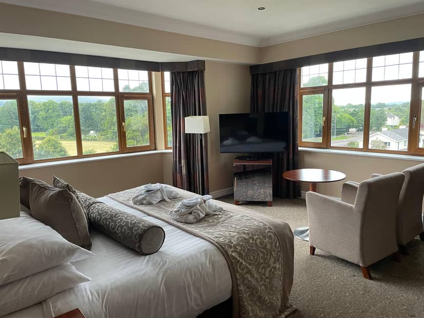 Elegant hotel room, natural light, perfect for events and meetings at The Brehon Hotel.