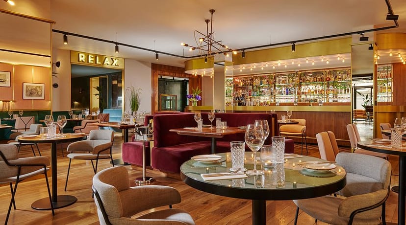 Stylish restaurant in The Alex Hotel's Secret Garden, perfect for intimate gatherings and networking.