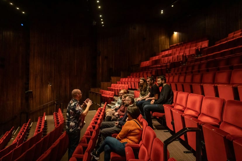 Intimate Abbey Theatre studio with engaging audience in red seating for workshops.