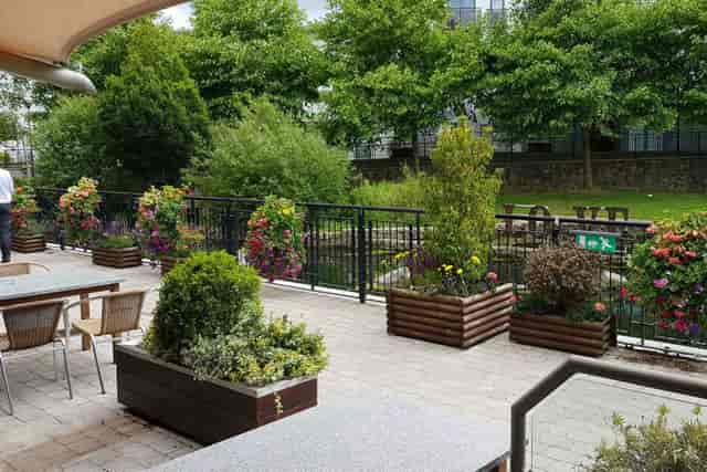 "Parkview Hotel gardens: vibrant flowers, ideal for networking receptions and casual gatherings."