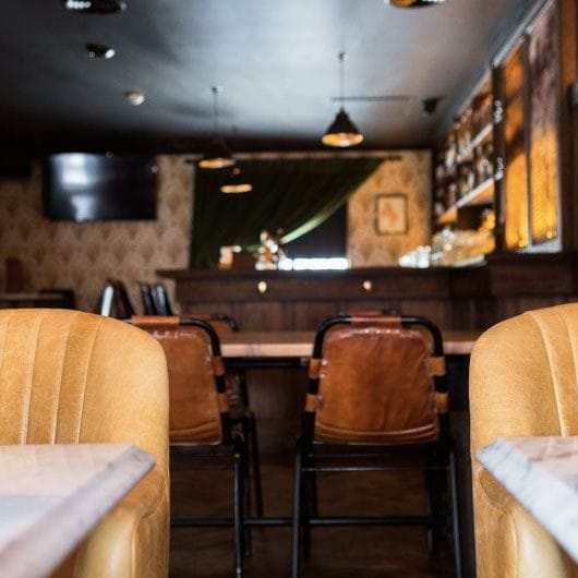 River Room: cozy bar, event venue, meeting space