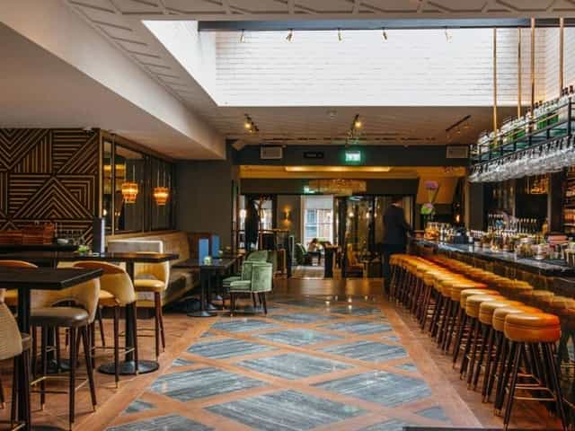 Contemporary bar at Iveagh Garden Hotel, ideal for networking events and informal meetings.